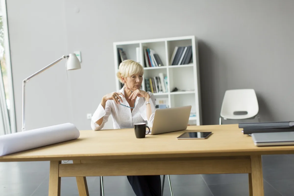 Middle-aged woman working in an office